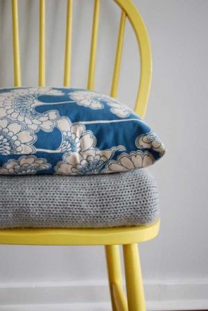 florence broadhurst cushions on yellow chair.jpg